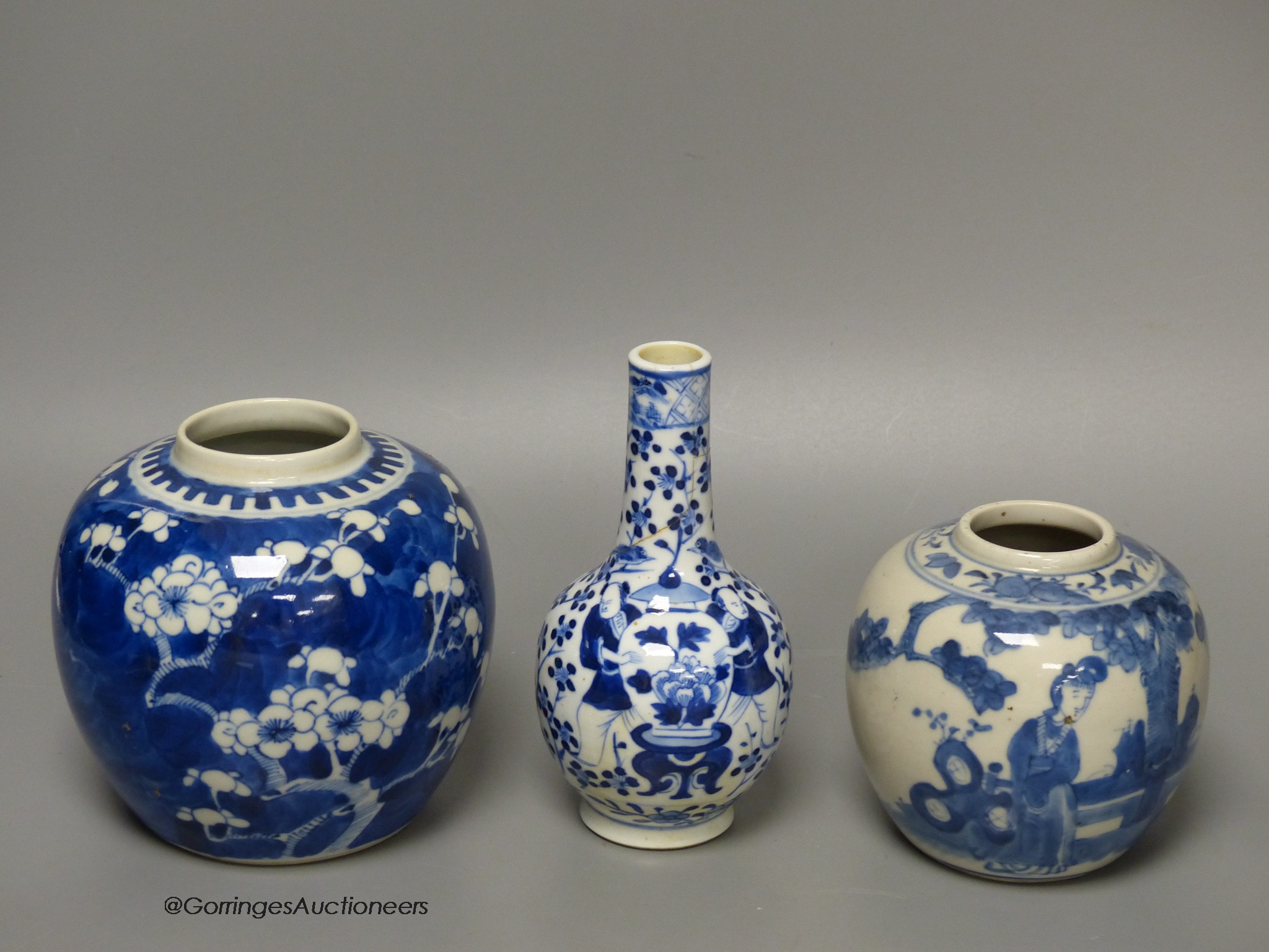 A Chinese blue and white 'ladies' jar, a 'boys' vase and a prunus jar, late 19th / early 20th century, tallest 15cm